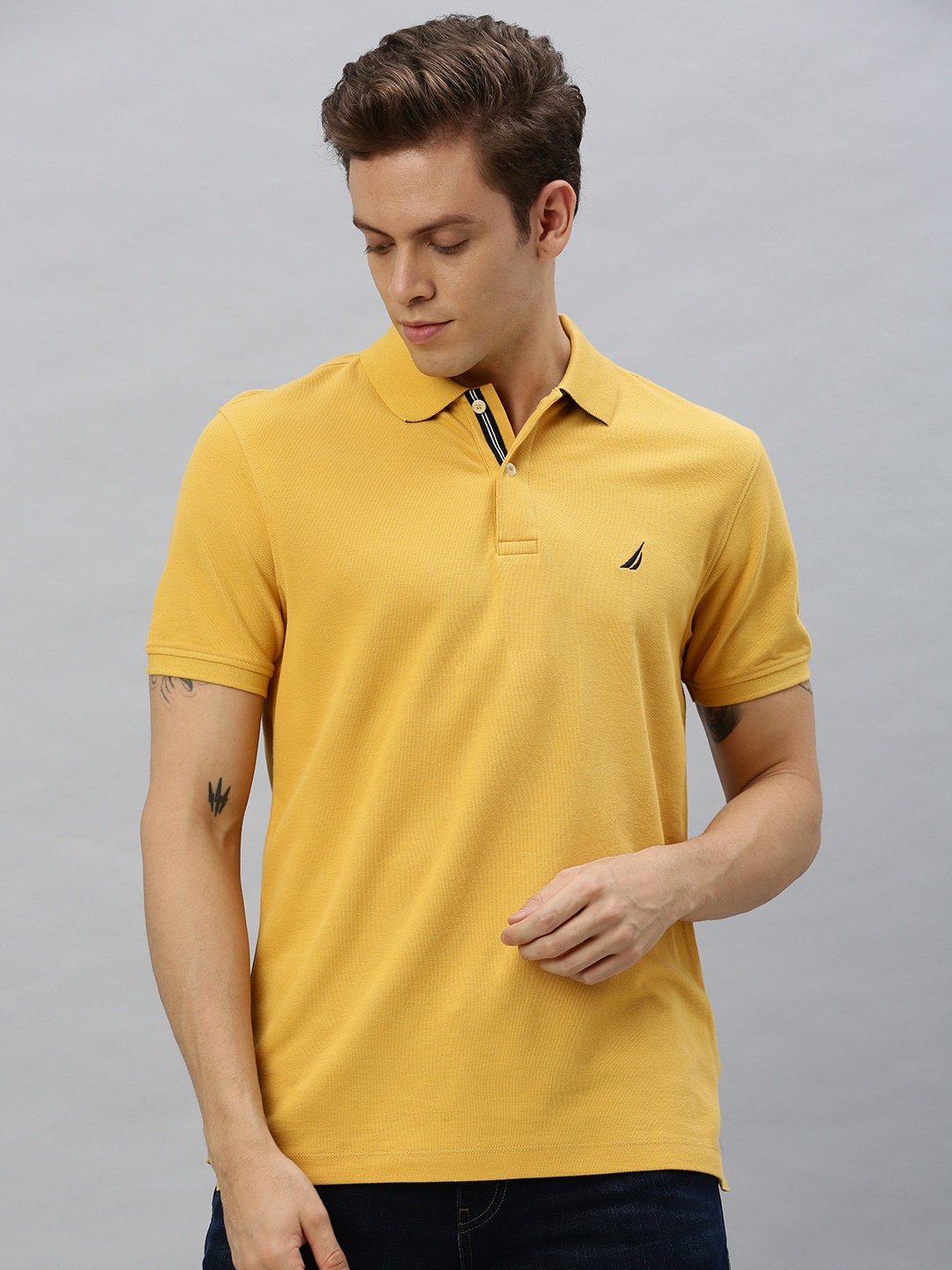 

Nautica Men Mustard Yellow Solid Polo Collar Embroidered Pure Cotton Slim Fit T-shirt