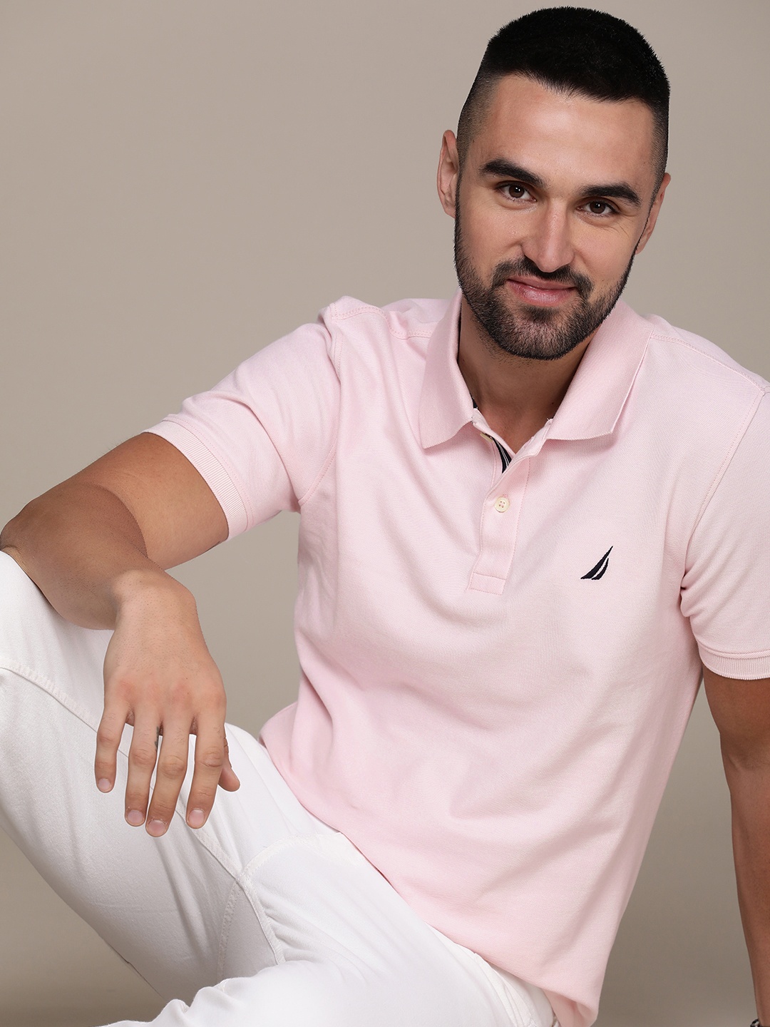 

Nautica Men Pink Solid Polo Collar T-shirt