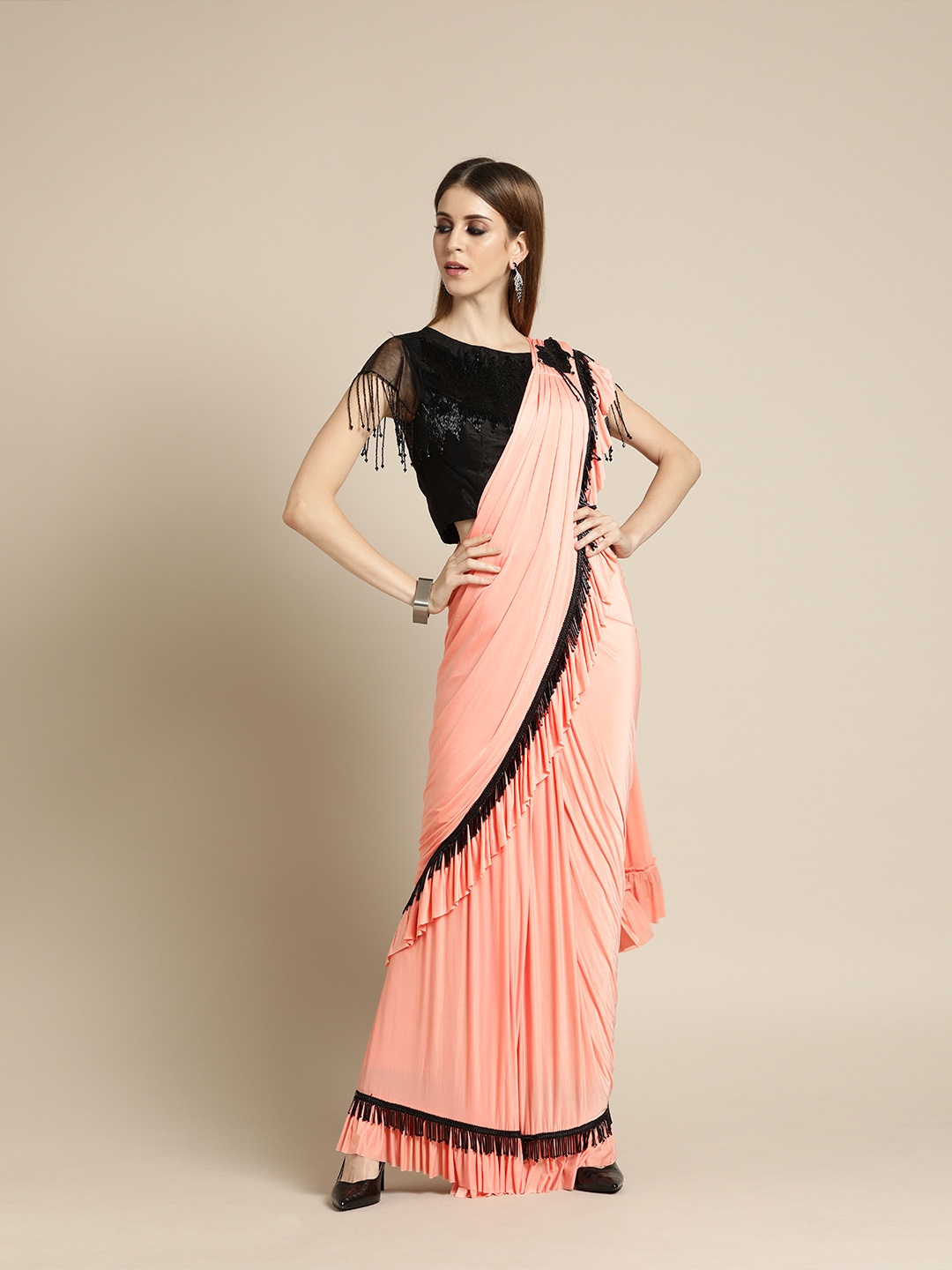 

Chhabra 555 Peach-Coloured & Black Poly Georgette Solid Saree