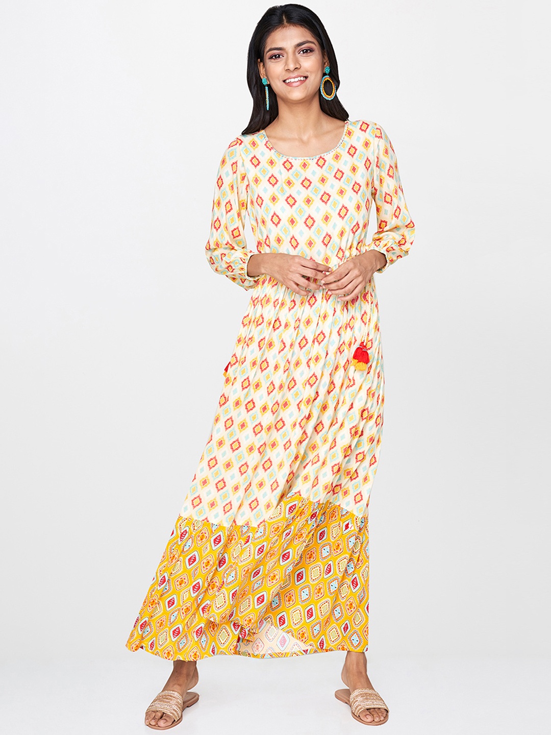 

Global Desi Women Off-White & Mustard Yellow Printed Maxi Dress