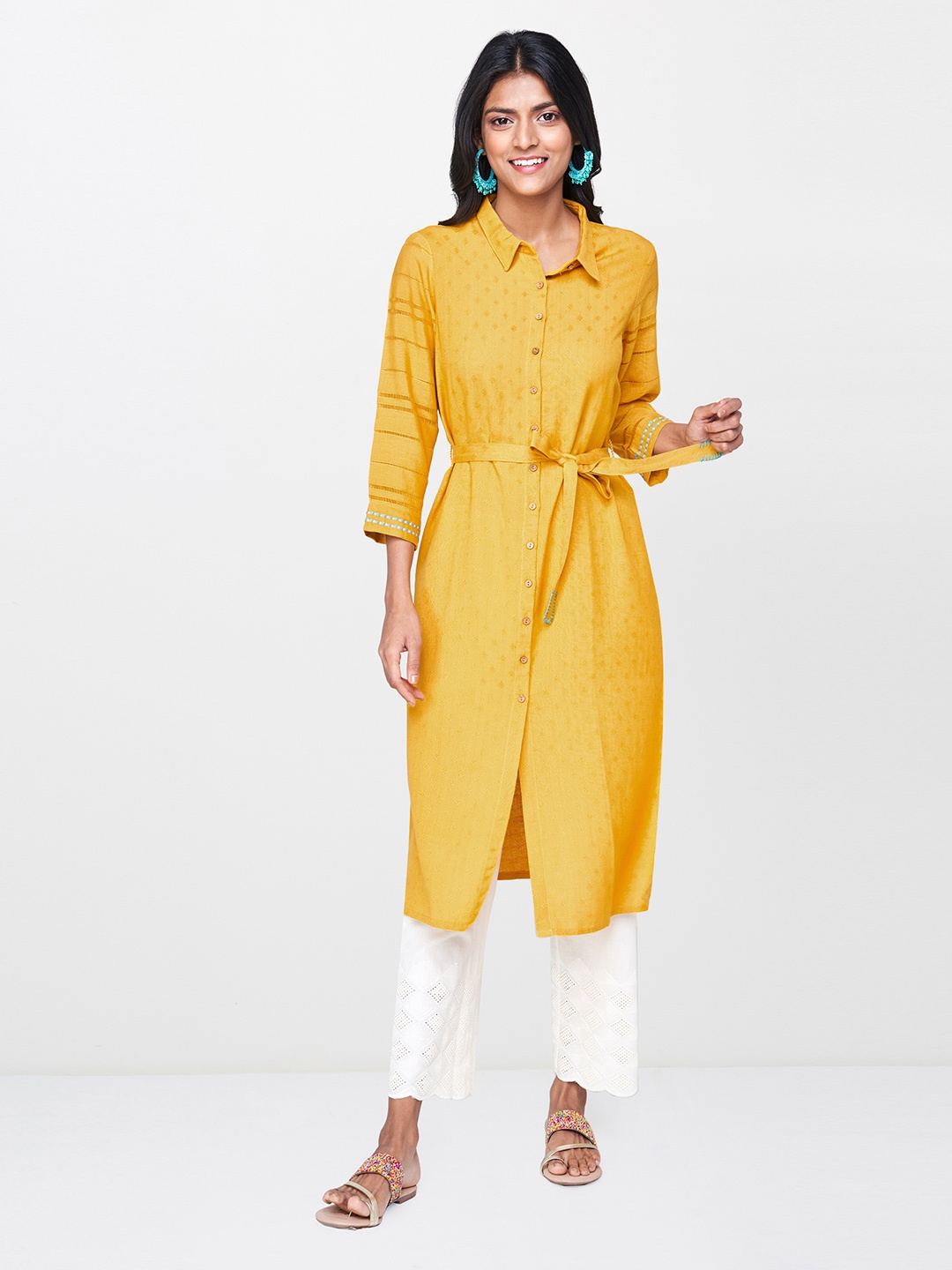 

Global Desi Women Mustard Yellow Self Design Tunic with Embroidered Detail