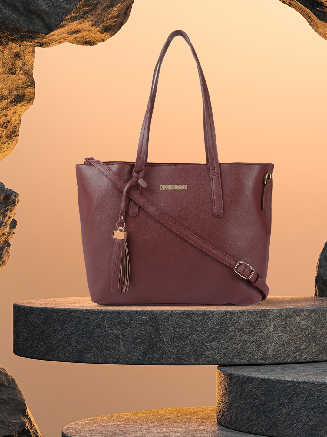 

Caprese Maroon Solid Shoulder Bag