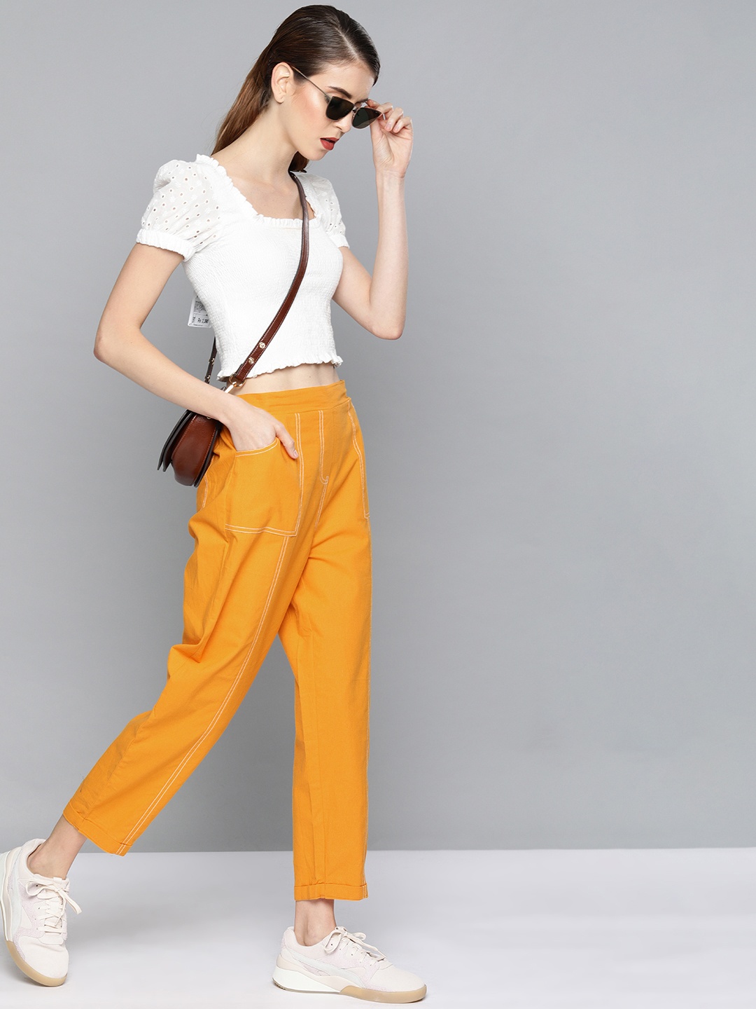 

SASSAFRAS Women Mustard Yellow Solid Regular Trousers