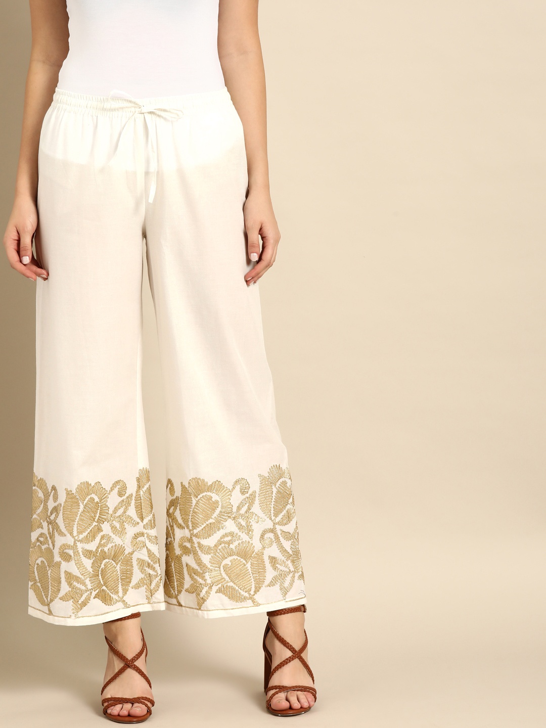 

Soch Women White & Golden Embellished Wide Leg Palazzos