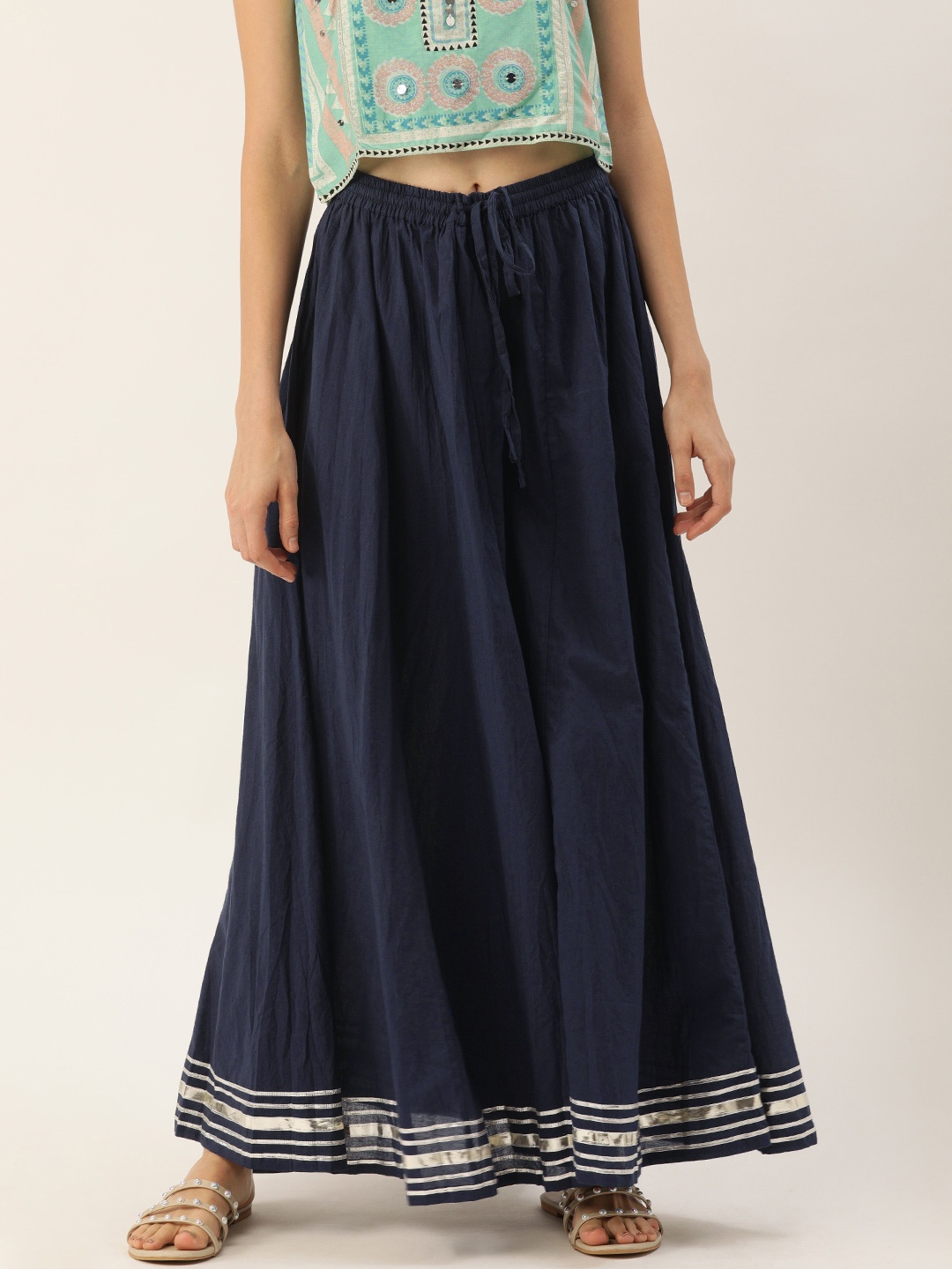 

Soch Women Navy Blue Solid Flared Palazzos With Zari Taping