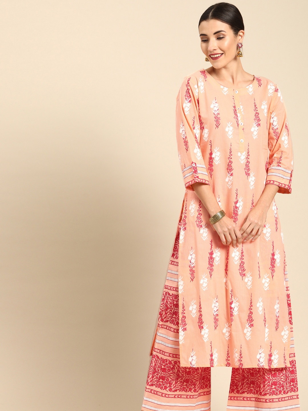 

Varanga Women Peach-Coloured & Red Screen Technique Printed Kurta with Palazzos