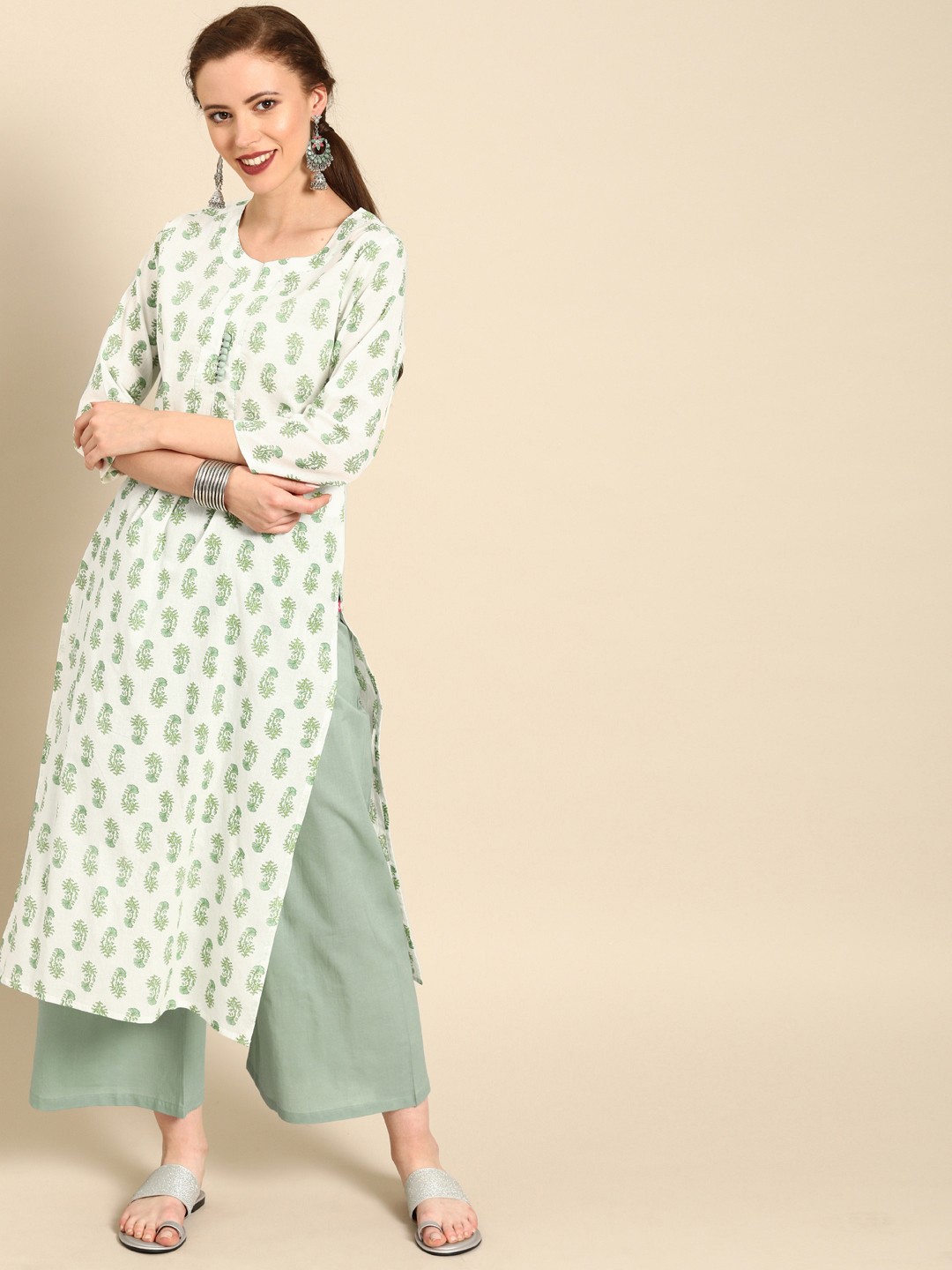 

Varanga Women Off-White & Green Screen Technique Printed Kurta with Palazzos