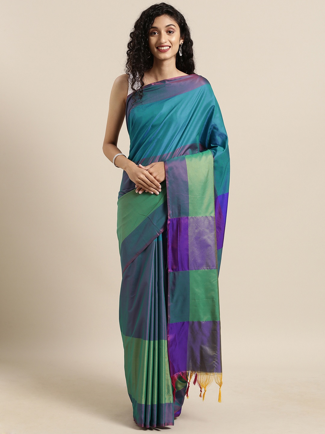 

Satrani Blue & Green Poly Silk Colourblocked Saree