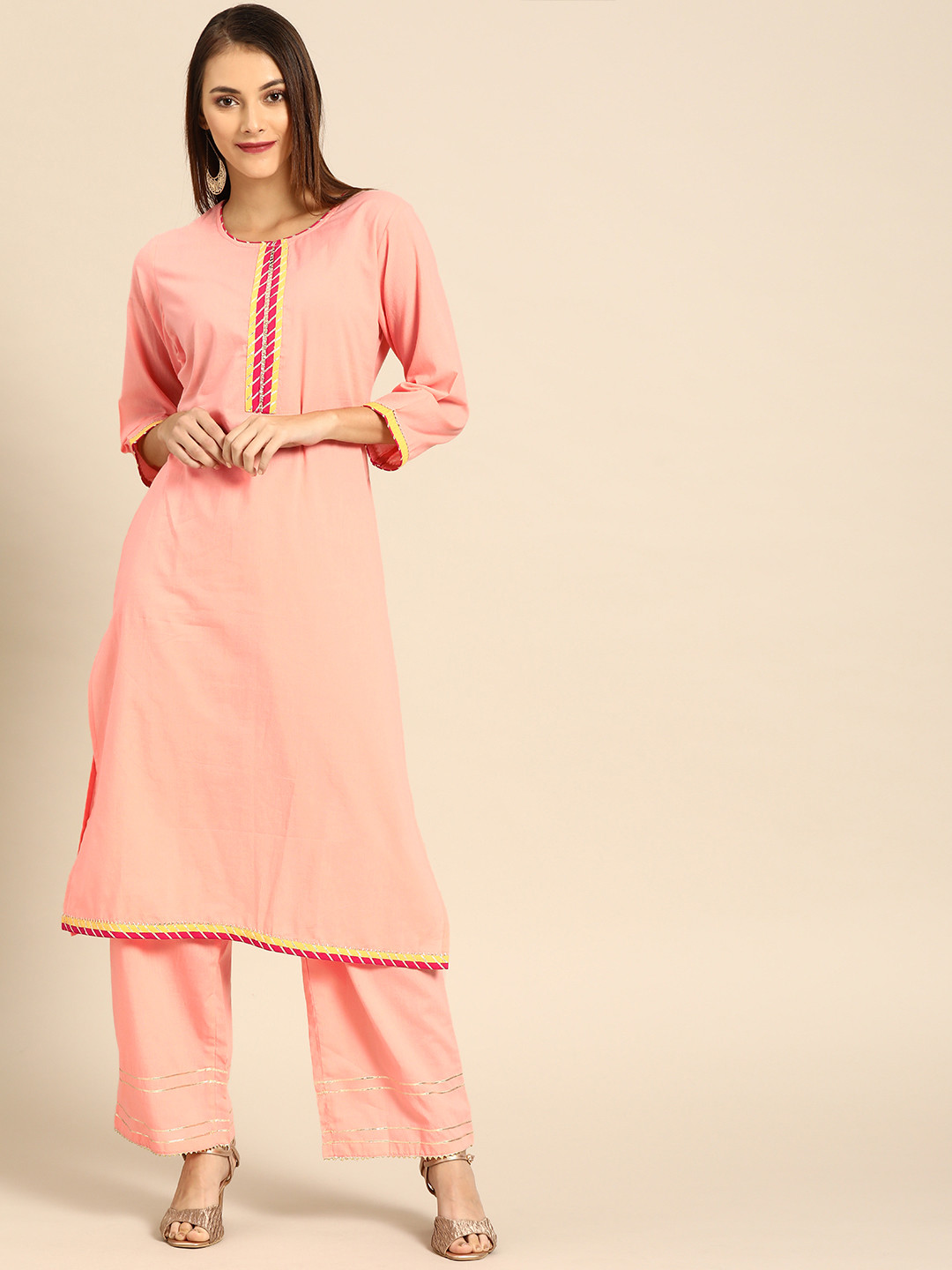 

Soch Women Peach-Coloured Solid Kurta with Palazzos