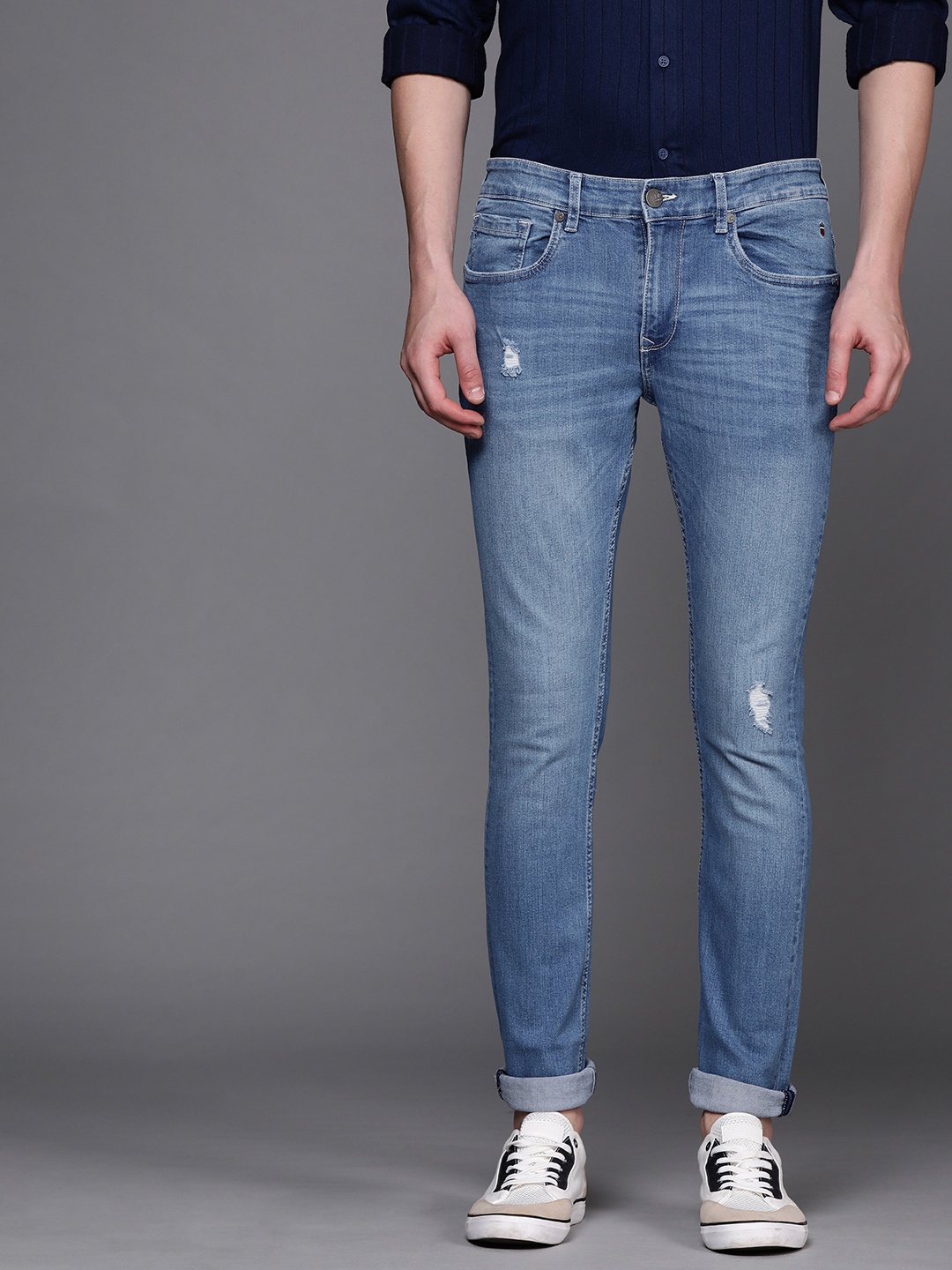 

Louis Philippe Jeans Men Blue Albert Slim Fit Low-Rise Mildly Distressed Stretchable Jeans