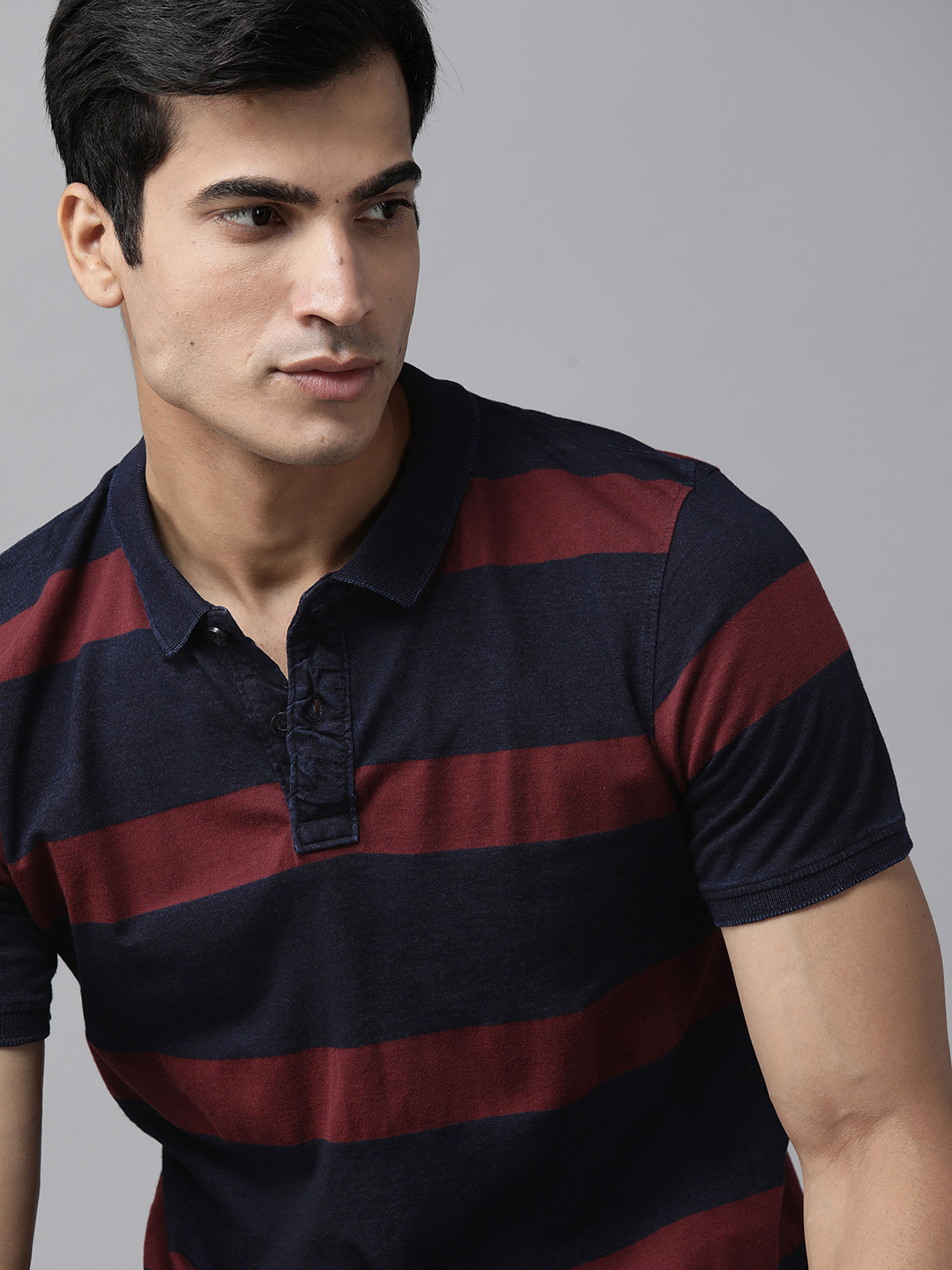 

Roadster Men Navy Blue & Maroon Striped Polo Collar T-shirt