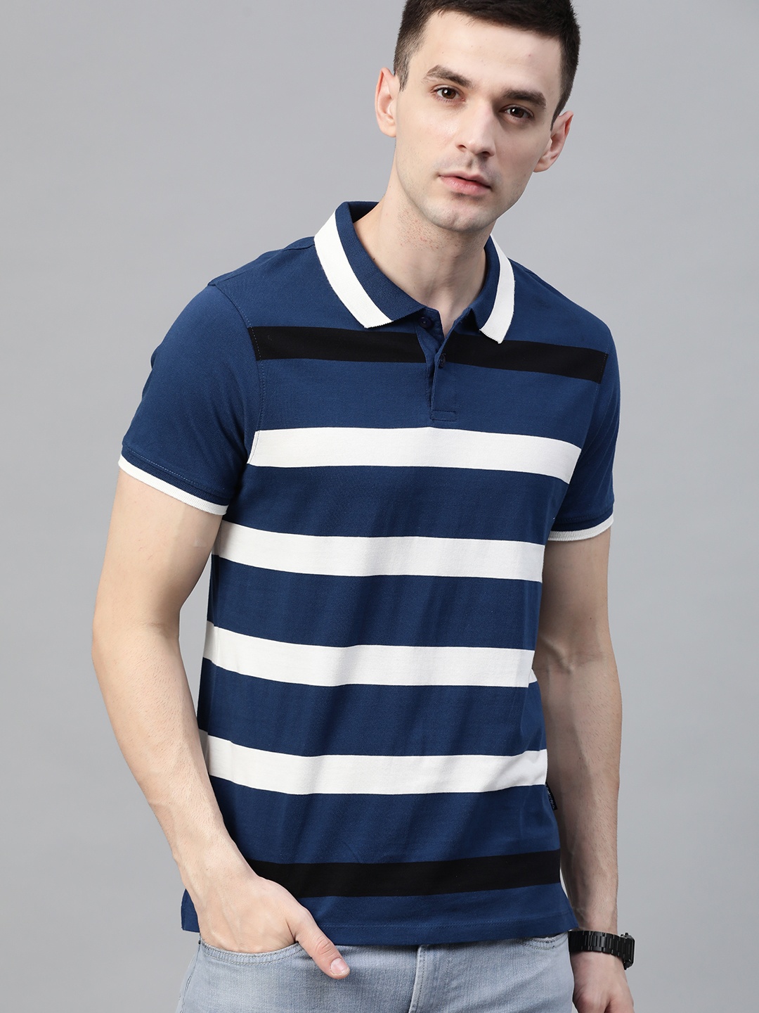 

Roadster Men Navy Blue White Striped Polo Collar Pure Cotton T-shirt