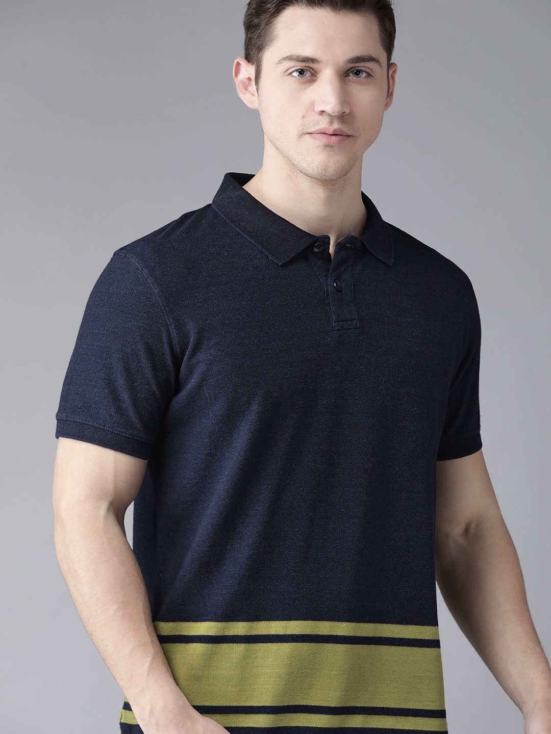 

Roadster Men Navy Blue & Green Striped Polo Collar T-shirt