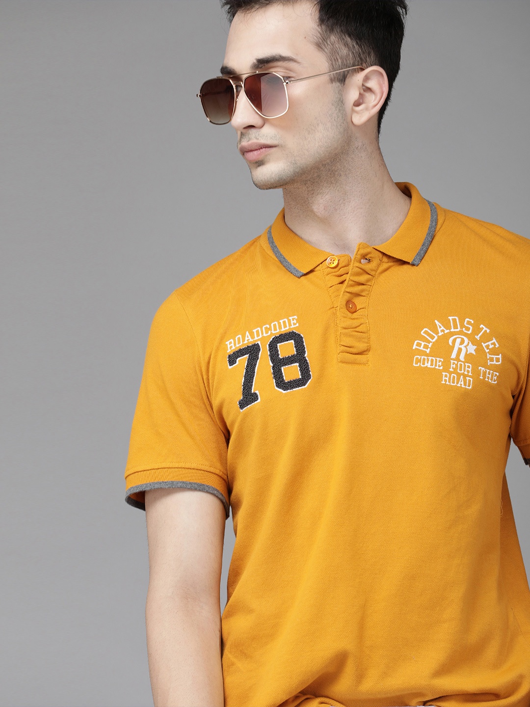 

Roadster Men Mustard Yellow Solid Polo Collar Pure Cotton T-shirt with Embroidery