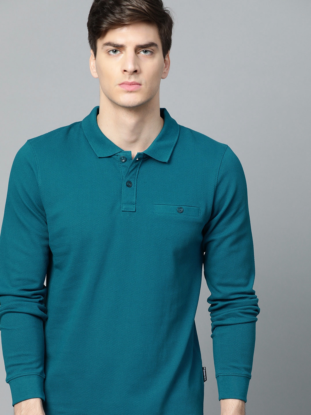 

Roadster Men Teal Blue Solid Polo Collar T-shirt