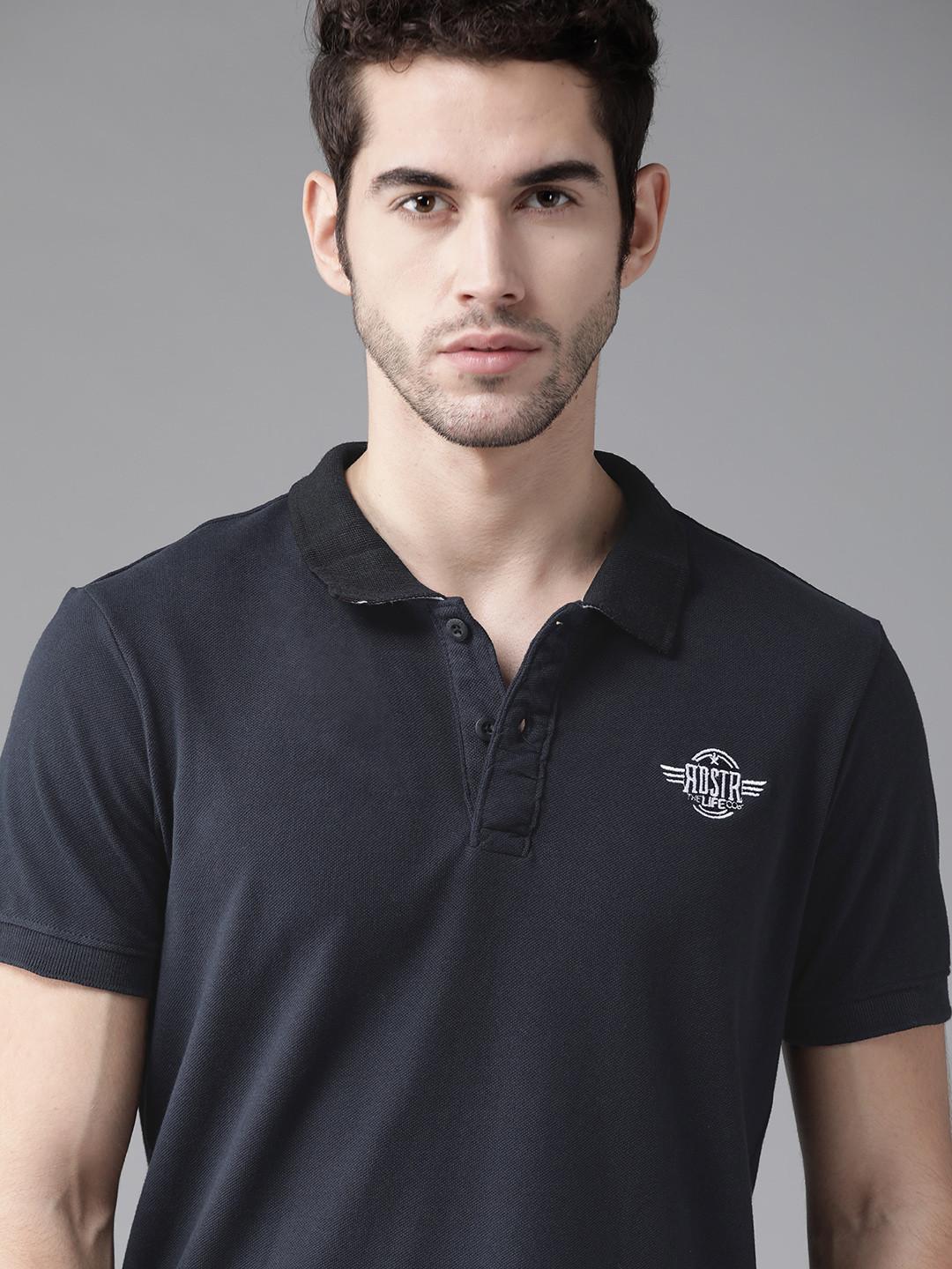 

Roadster Men Navy Blue Solid Polo Collar Pure Cotton T-shirt