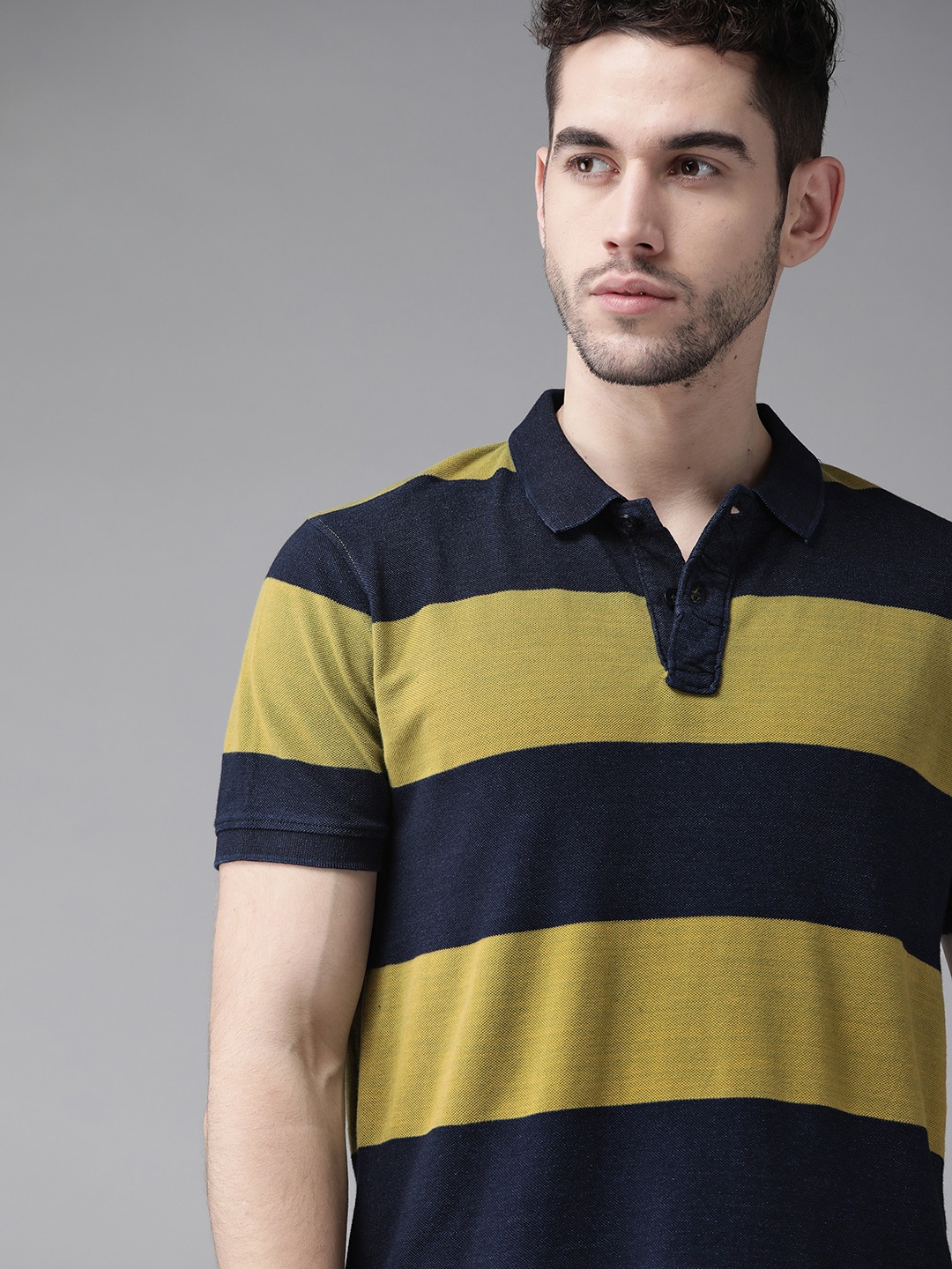 

Roadster Men Lime Green & Navy Blue Striped Polo Collar T-shirt