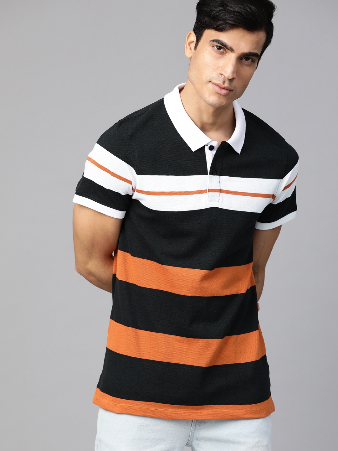 

Roadster Men White Black & Orange Striped Polo Collar T-Shirt