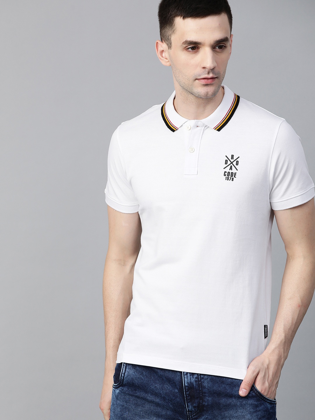 

Roadster Men White Solid Polo Collar T-shirt
