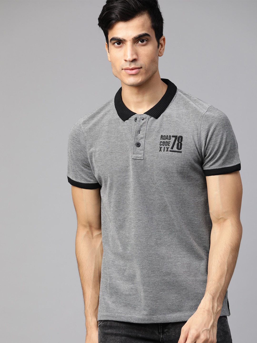 

Roadster Men Grey & Black Self Design Polo Collar T-shirt