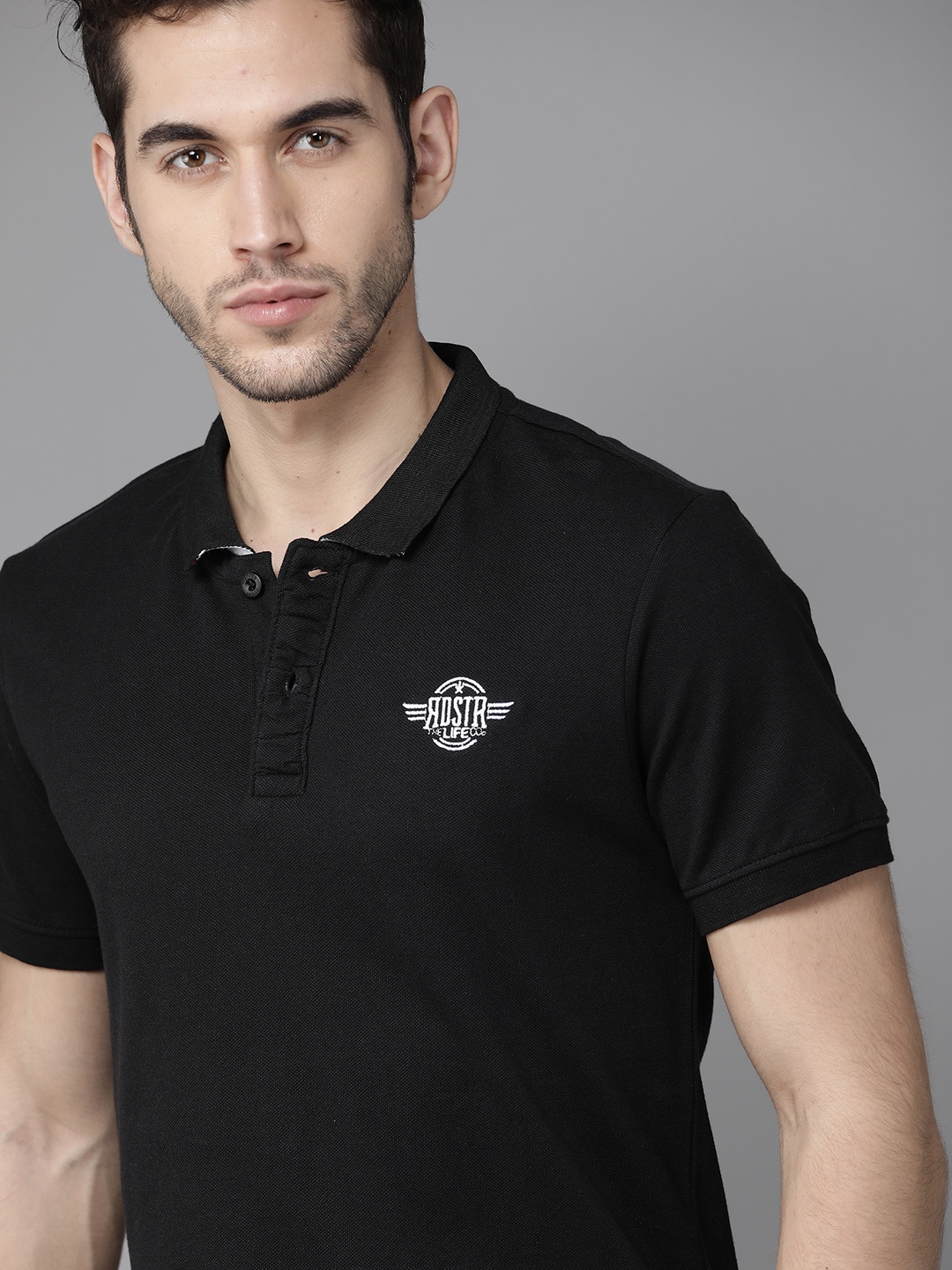 

Roadster Men Black Solid Polo Collar Pure Cotton T-shirt with Brand Logo Detail