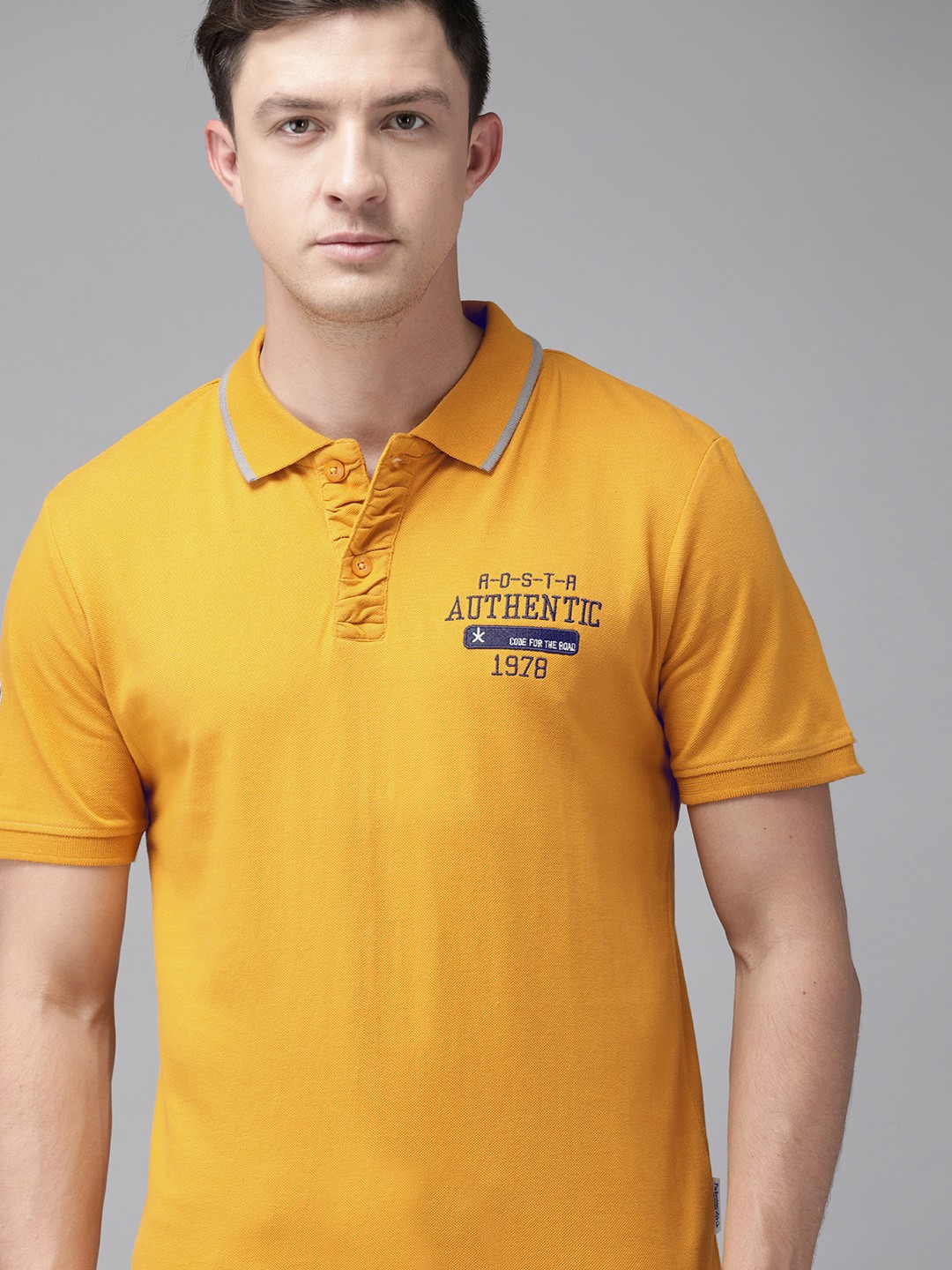 

Roadster Men Yellow Solid Polo Collar Pure Cotton T-shirt