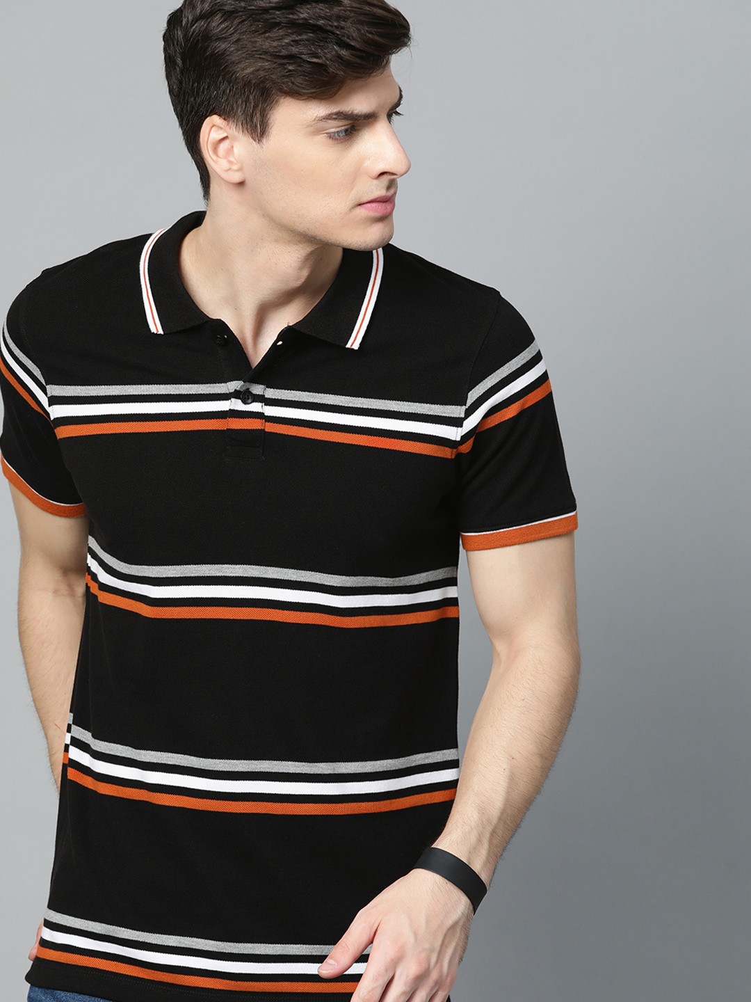 

Roadster Men Black Striped Polo Collar T-shirt
