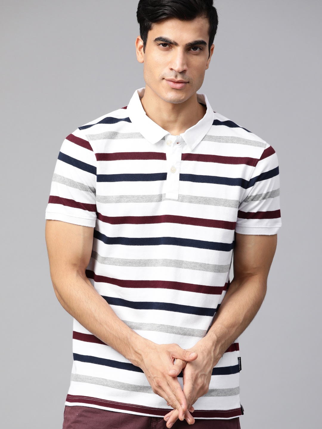 

Roadster Men White & Navy Blue Striped Polo Collar T-Shirt