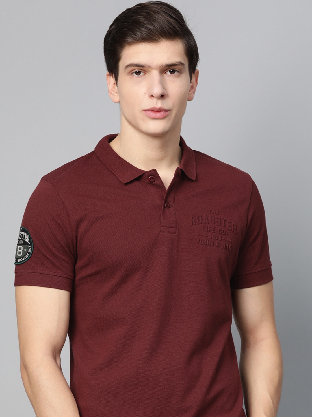 

Roadster Men Burgundy Solid Polo Collar T-shirt