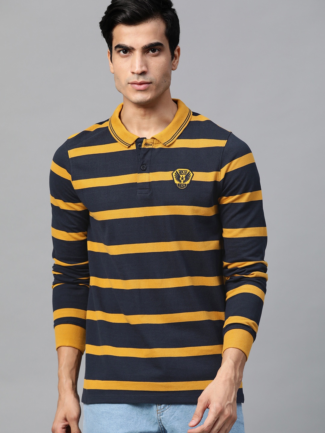 

Roadster Men Navy Blue & Mustard Yellow Striped Polo Collar T-shirt