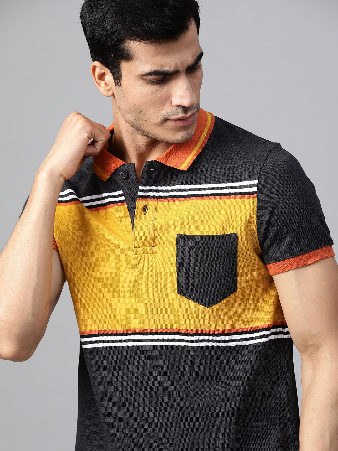 

Roadster Men Charcoal Grey & Mustard Yellow Colourblocked Polo Collar T-shirt