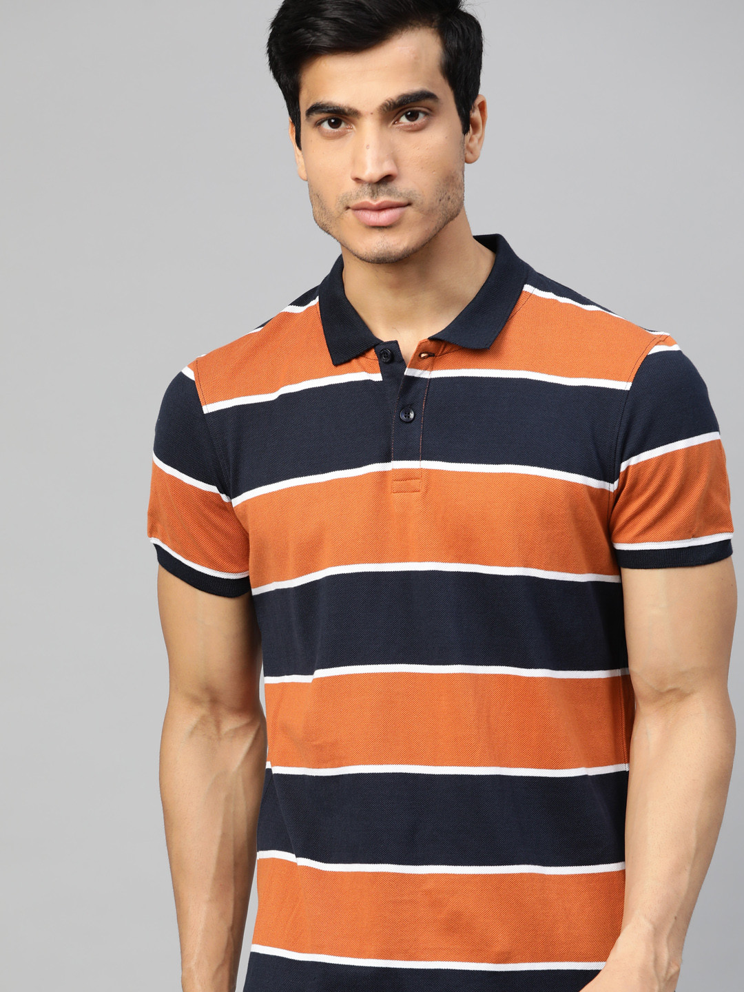 

Roadster Men Orange & Navy Blue Striped Polo Collar T-shirt