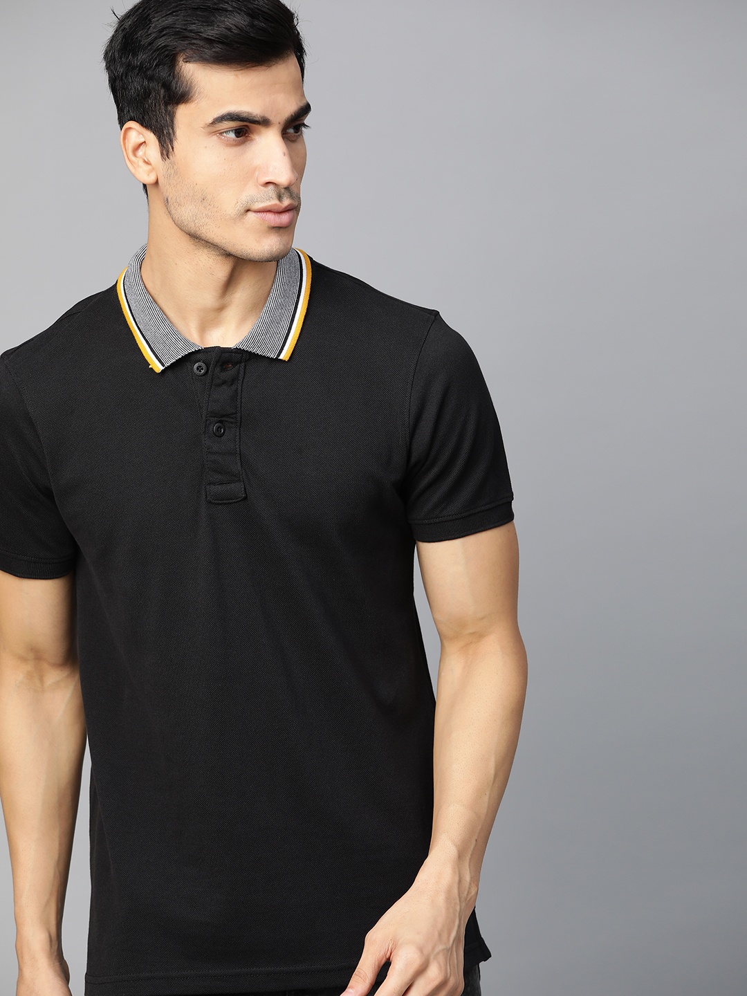 

Roadster Men Black Solid Polo Collar T-shirt