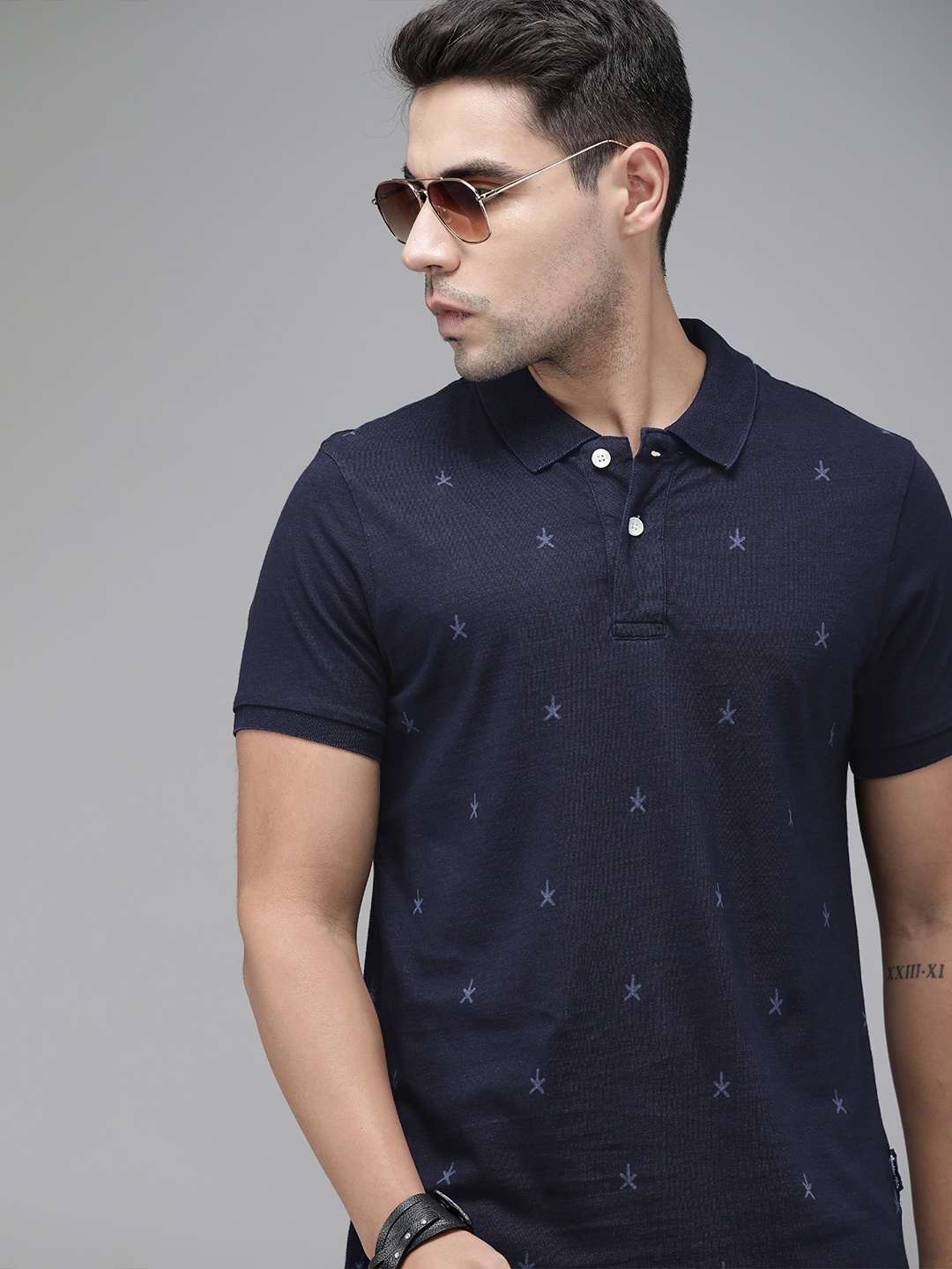 

Roadster Men Indigo Dyed Printed Polo collar T-shirt, Navy blue