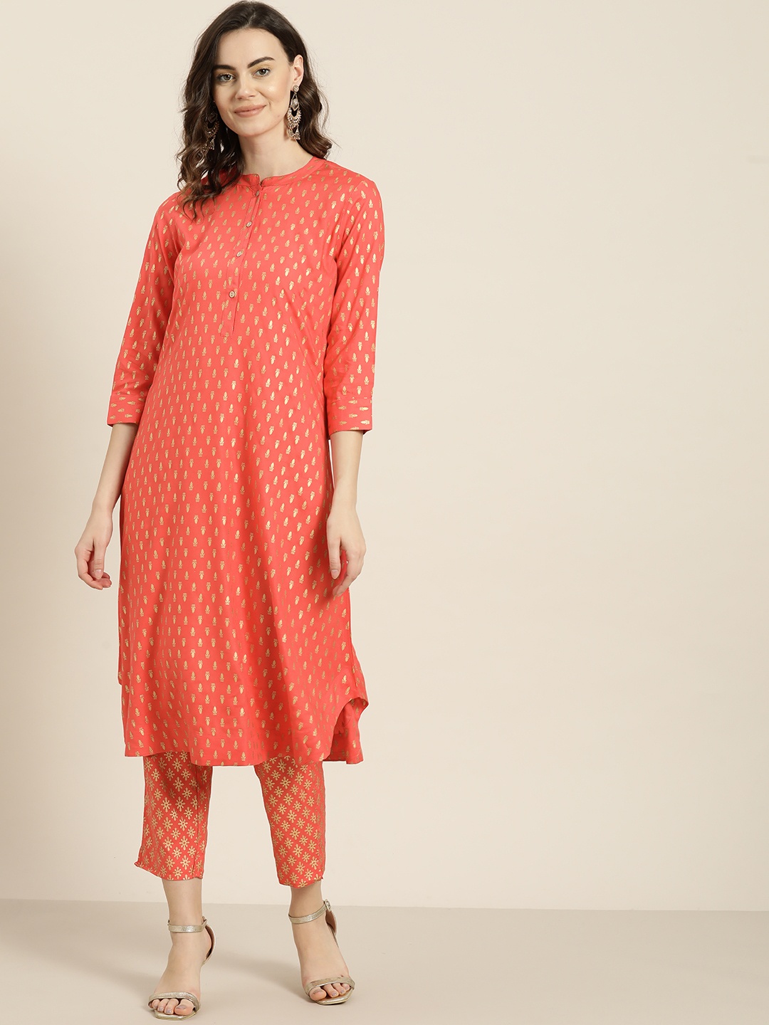 

Sangria Women Coral Pink & Golden Printed Kurta with Trousers