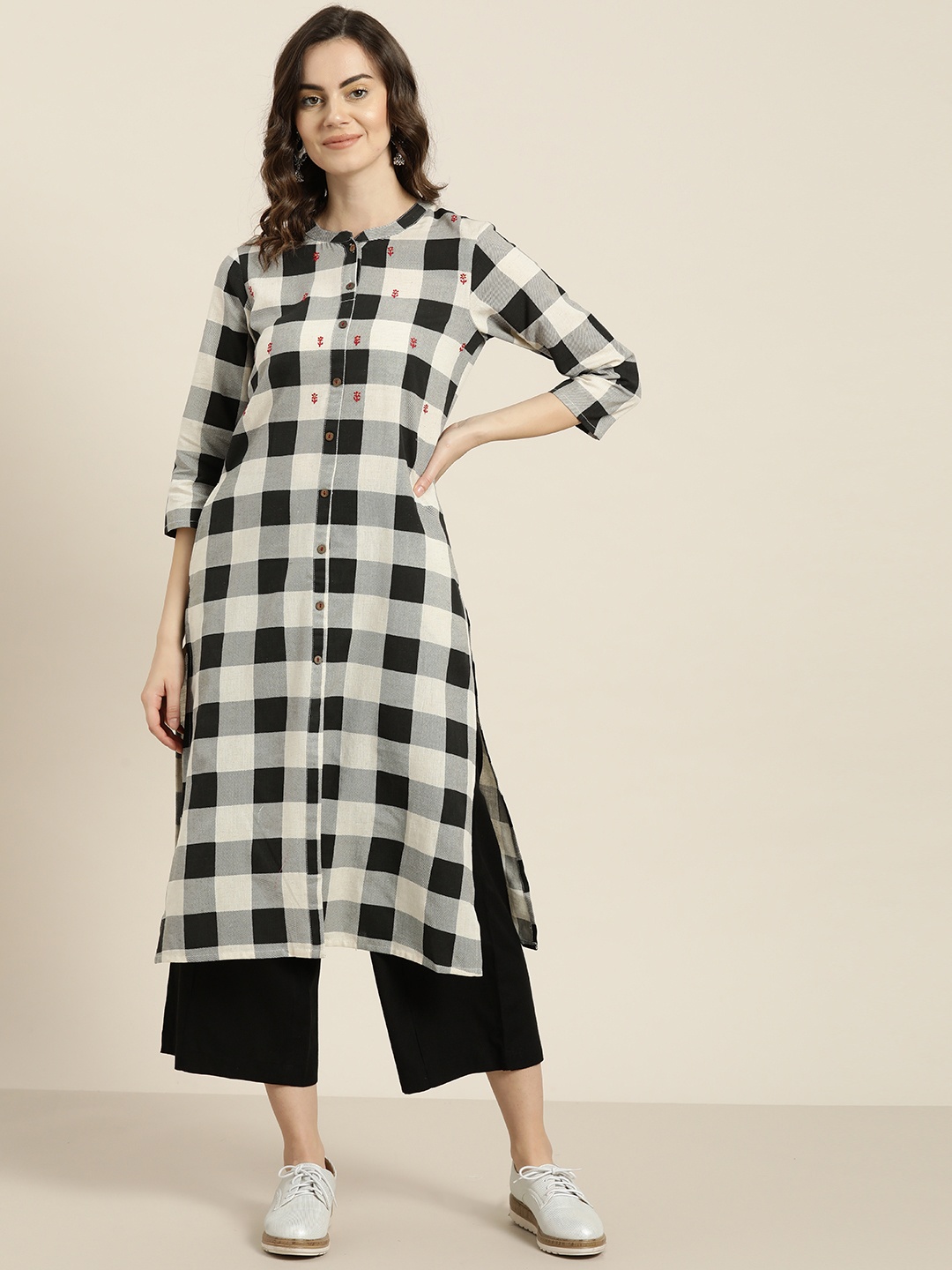 

Sangria Women Off-White & Black Checked Kurta with Palazzos