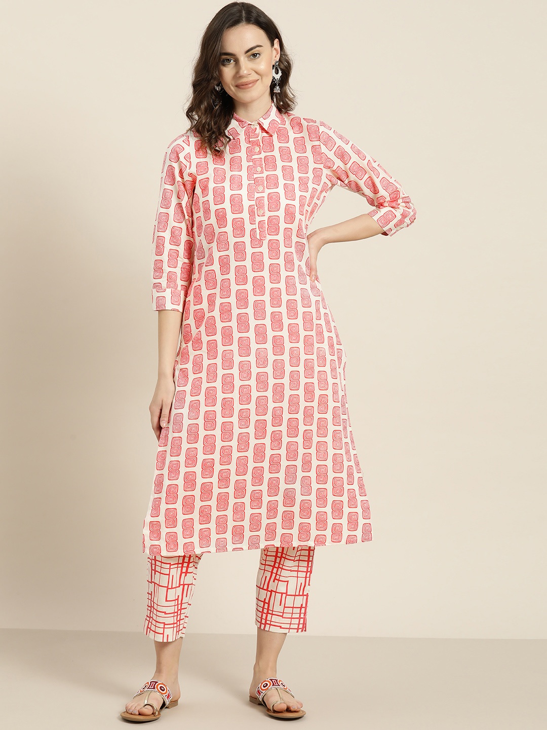 

Sangria Women Off-White & Coral Pink Printed Kurta with Trousers