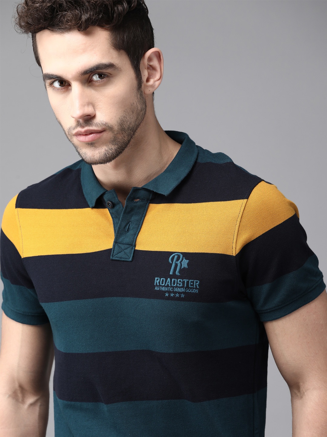 

Roadster Men Navy Blue & Mustard Yellow Striped Cotton Polo Collar T-shirt