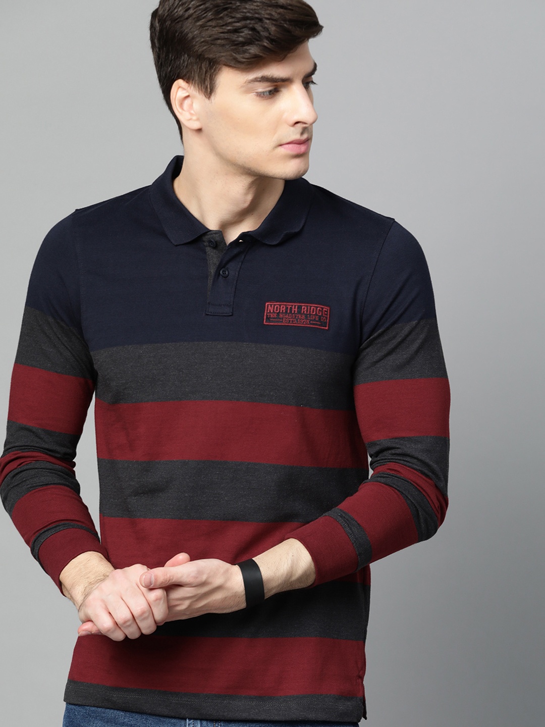 

Roadster Men Navy Blue & Maroon Striped Polo Collar T-shirt