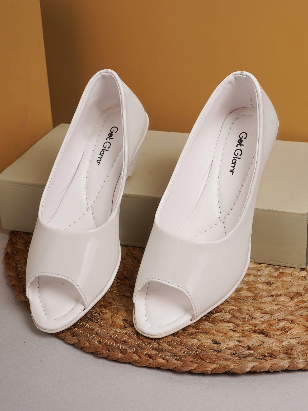 

Get Glamr Women White Solid Wedges