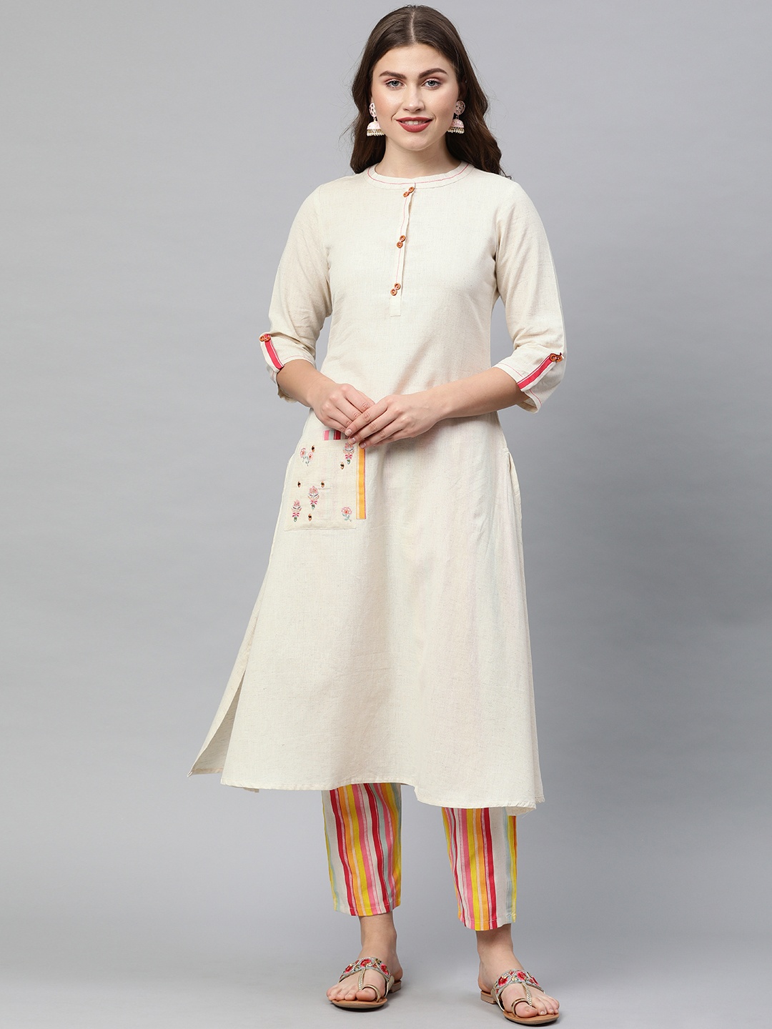 

Neerus Women Off-White Solid Straight Kurta With Detailed Pocket