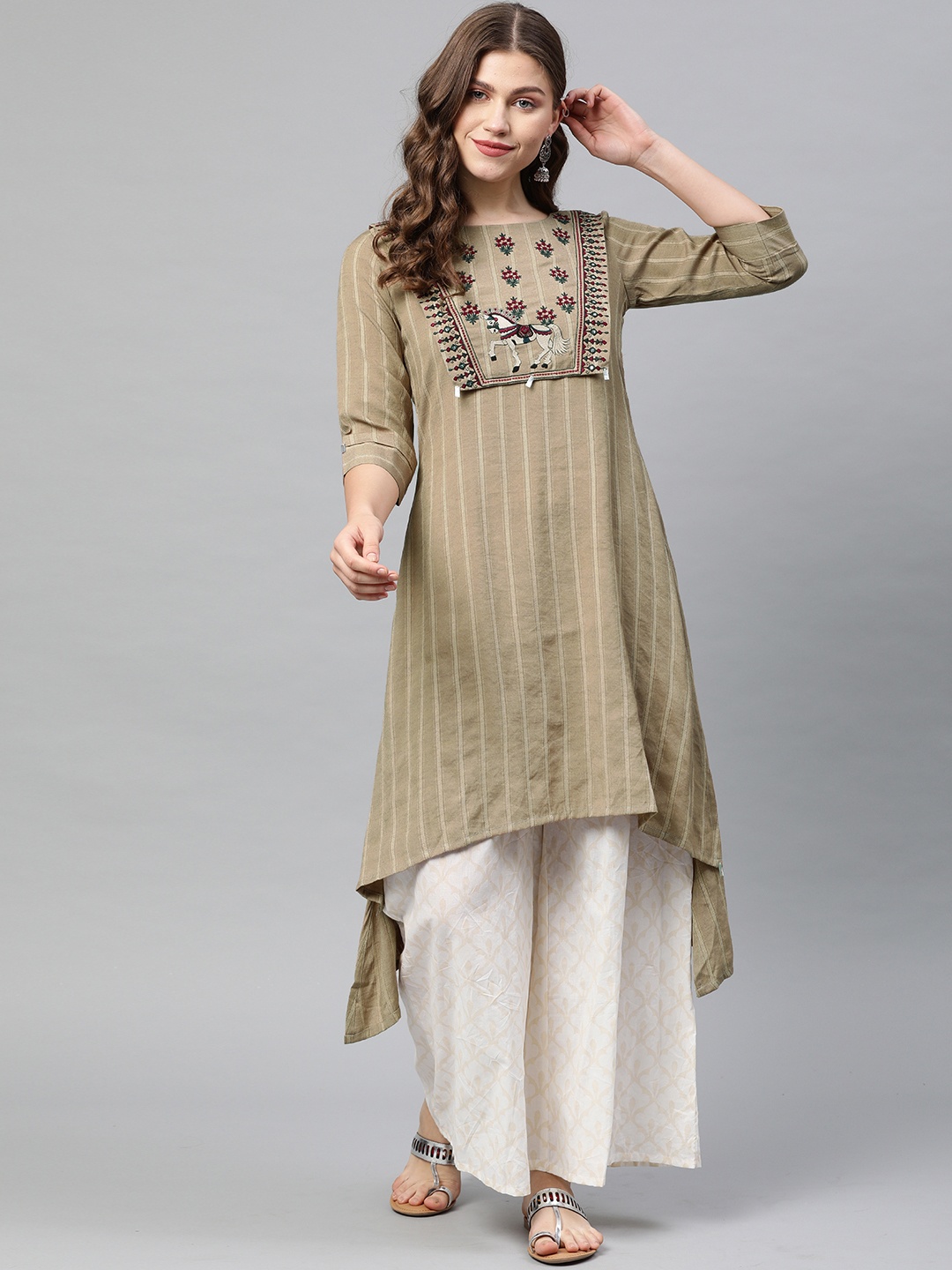 

Neerus Women Beige Yoke Design Asymmetric Straight Kurta with Embroidered Detail