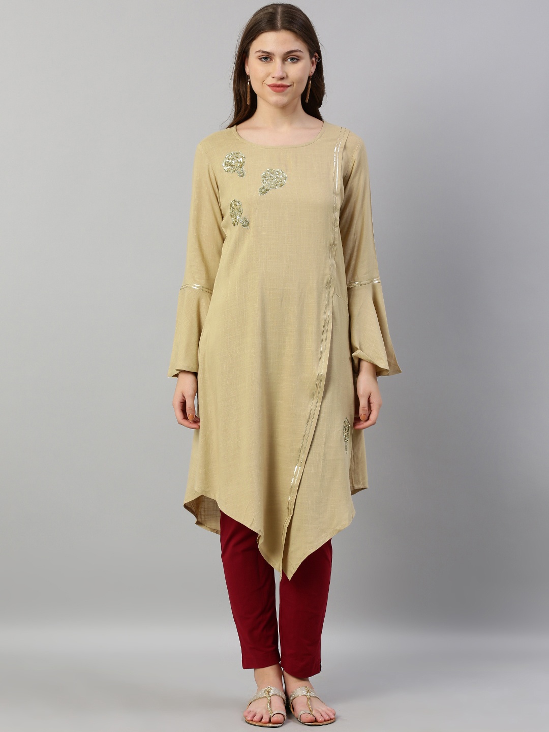 

Neerus Women Beige Solid Asymmetric A-Line Kurta with Sequins