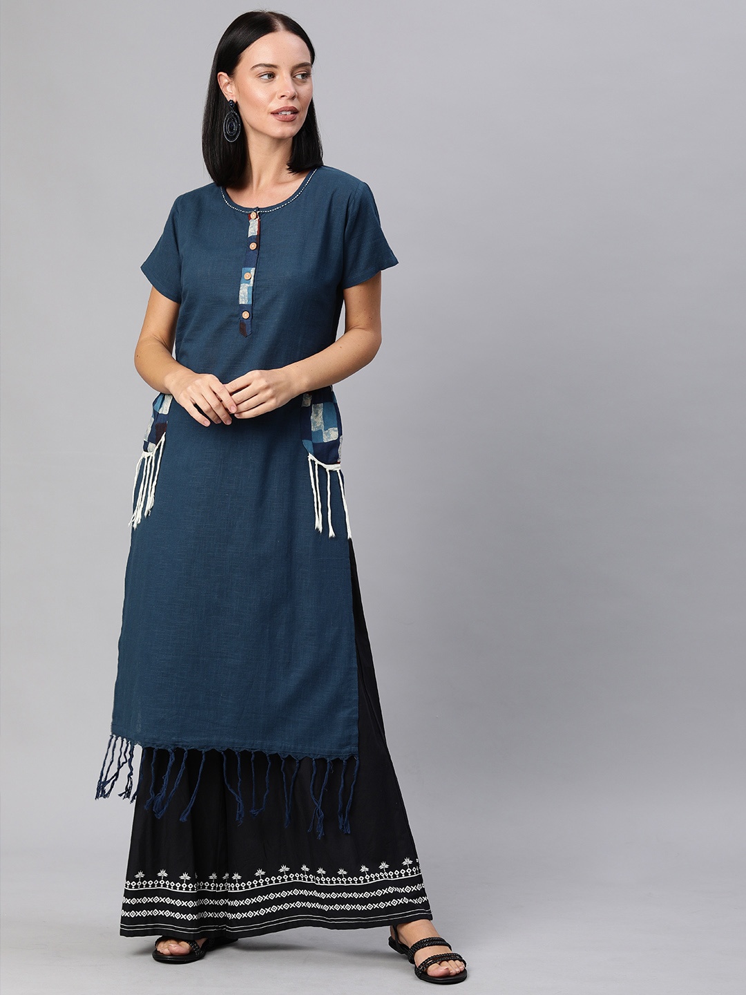 

YASH GALLERY Women Navy Blue Solid Straight Kurta With Tasseled Hem & Side Pockets