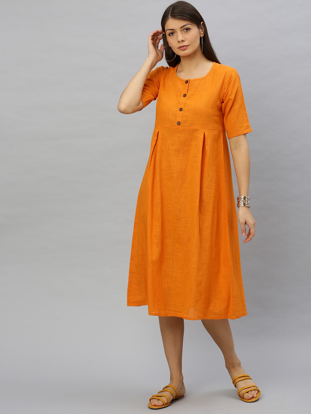

YASH GALLERY Women Mustard Yellow Solid Pleated A-Line Dress
