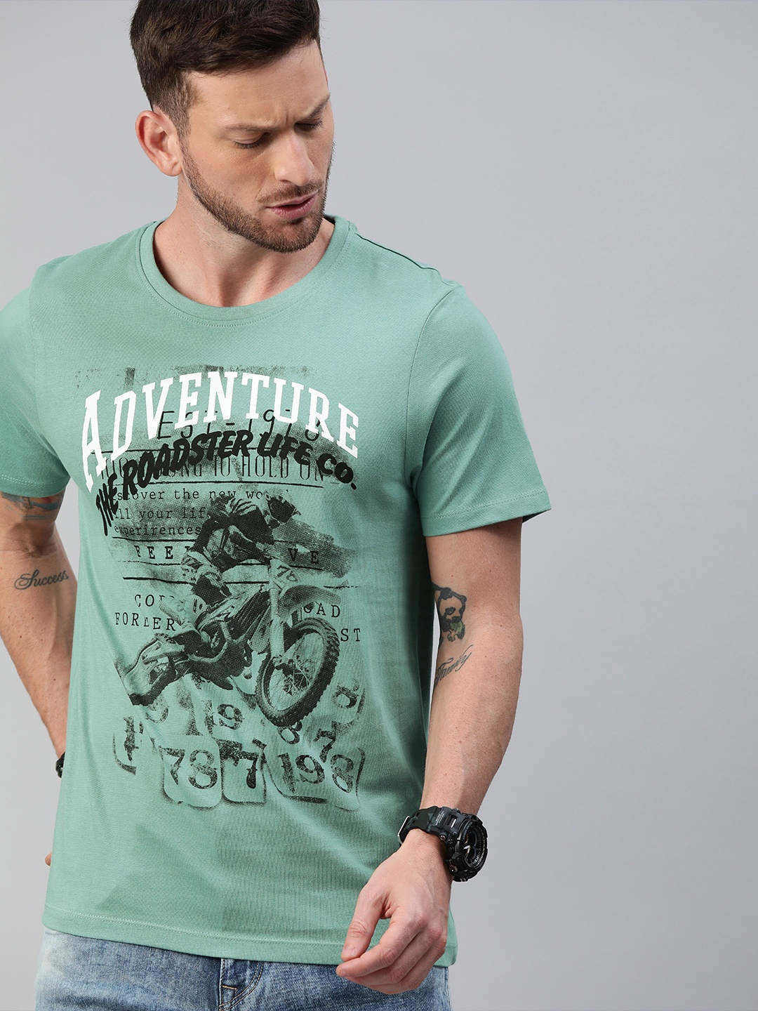 

Roadster Men Green Printed Round Neck Pure Cotton T-shirt