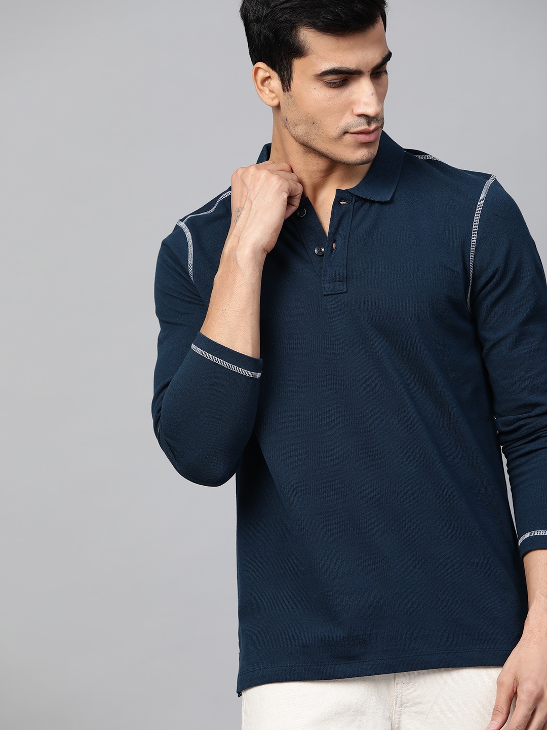 

Roadster Men Teal Blue Solid Polo Collar Pure Cotton T-shirt