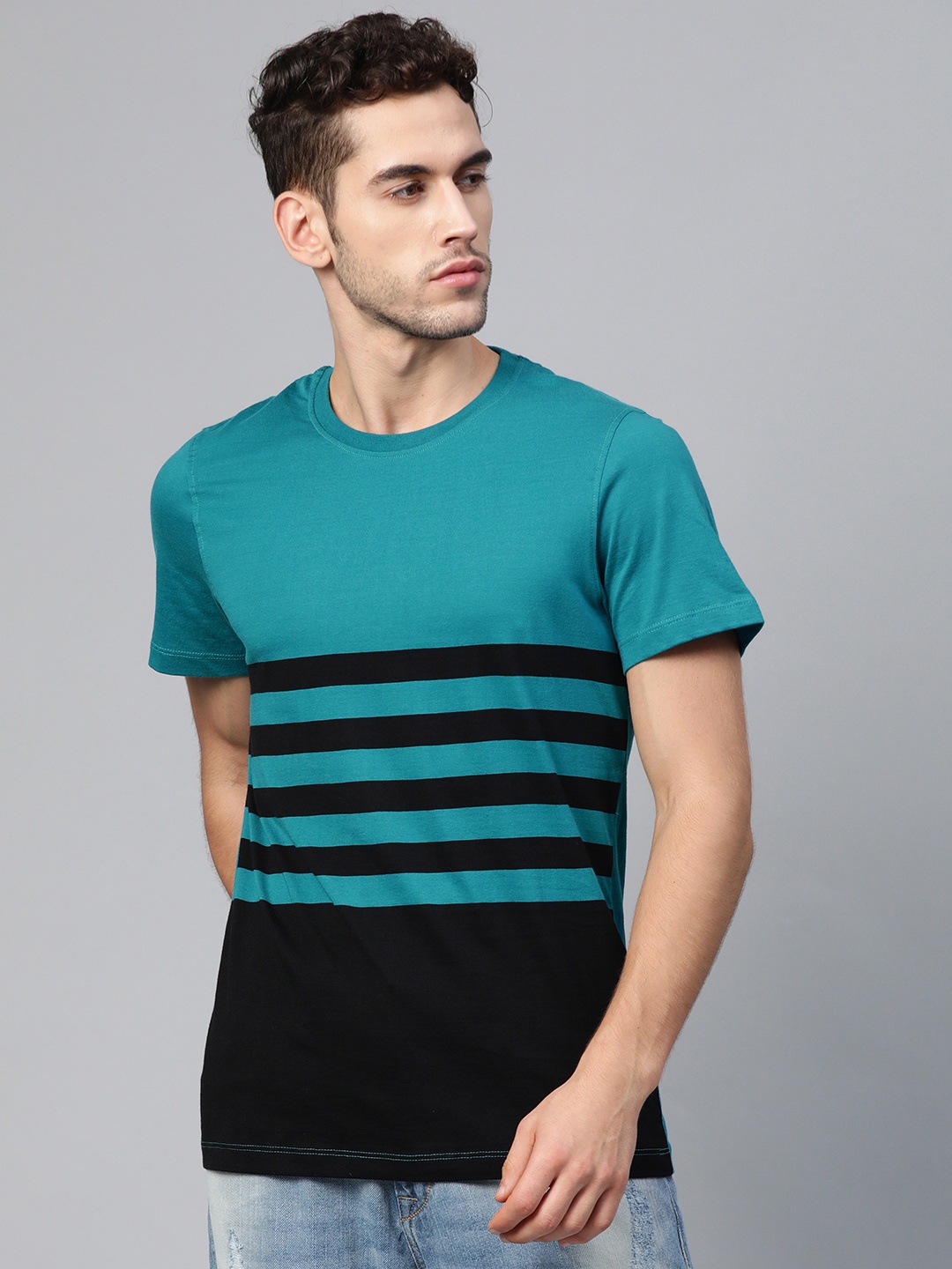

Roadster Men Blue & Black Striped Round Neck T-shirt