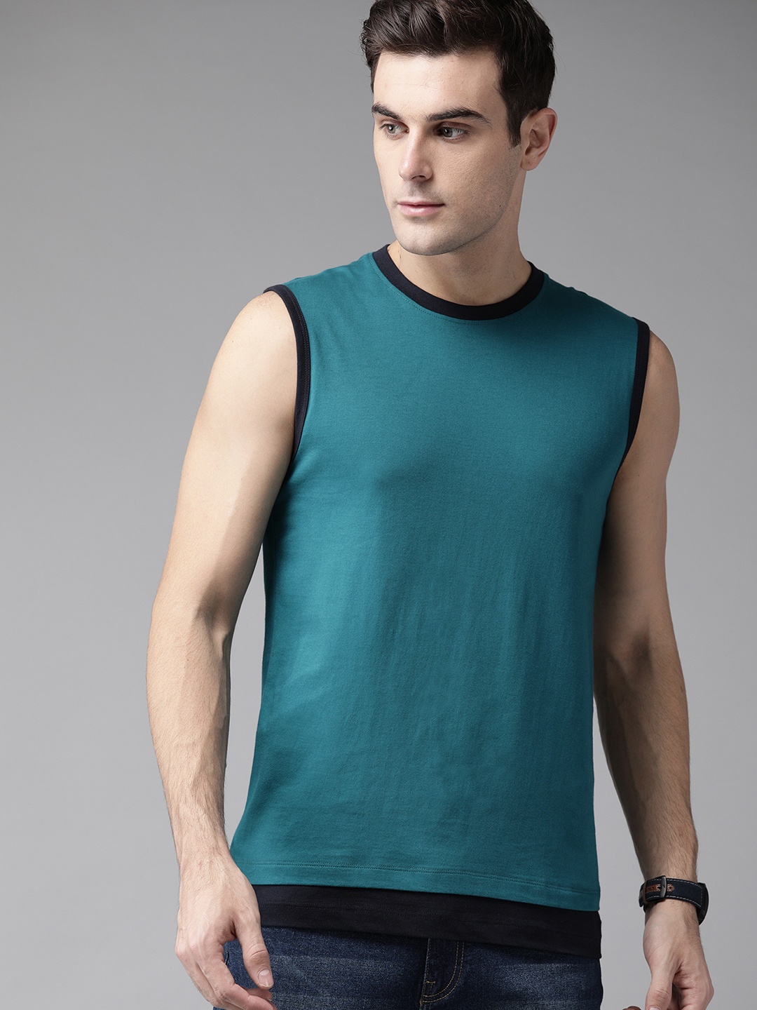 

Roadster Men Teal Green Solid Round Neck Pure Cotton T-shirt