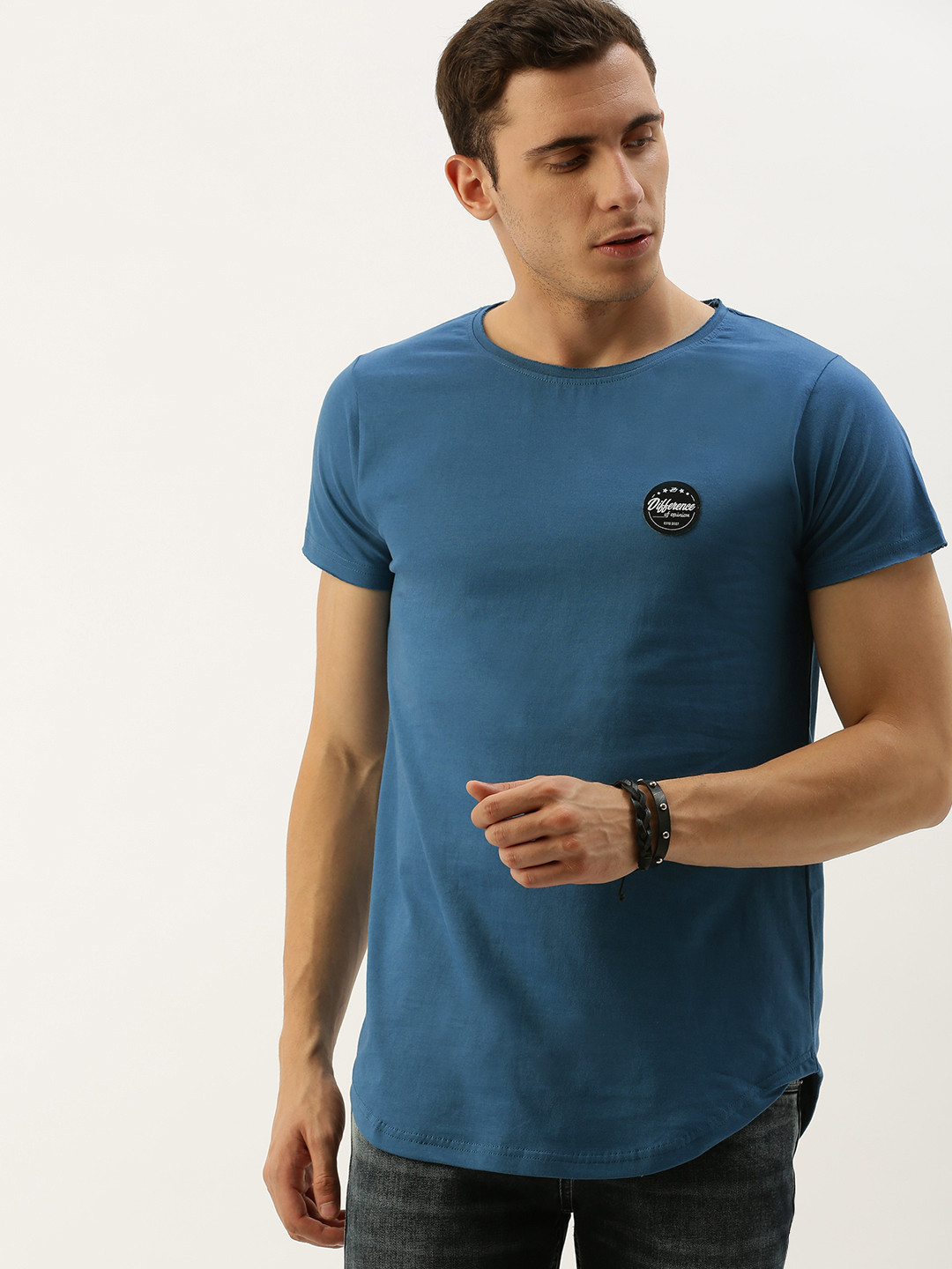 

Difference of Opinion Men Teal Blue Solid Round Neck Pure Cotton T-shirt with Applique Detail